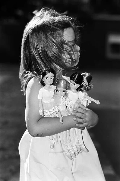4 year old Sophie O Donnell with her Sindy dolls. 20th August 1980