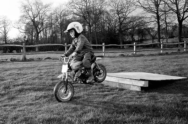 4 years old Jan Dixon on his mino motor bike. December 1974 74-7664-006