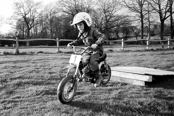 4 years old Jan Dixon on his mino motor bike. December 1974 74-7664-003