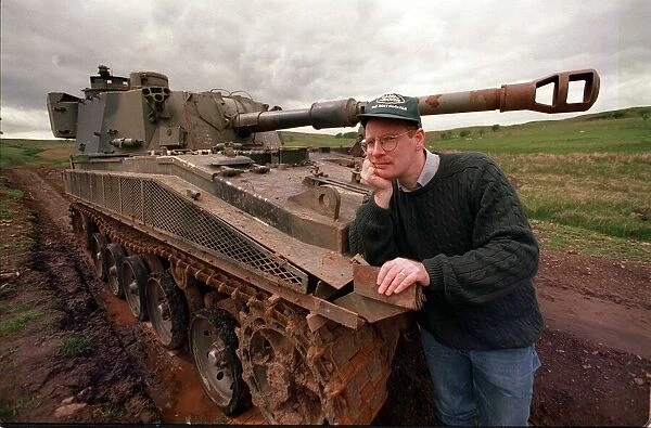 4X4 off road instruction for road record instructor beside battle tank circa 1990s