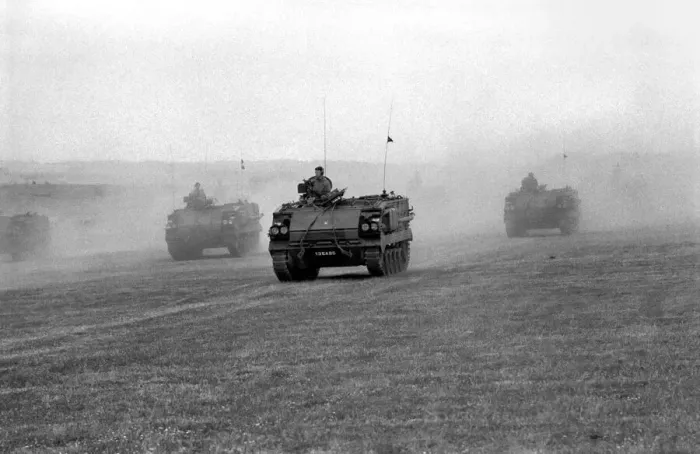 Framed Print : 50 years of Gunnery Anniversary: Two soldiers sweep the seats in readiness for Saturdays Framed Print : 50 years of Gunnery Anniversary: Two soldiers sweep the seats in readiness for Saturdays