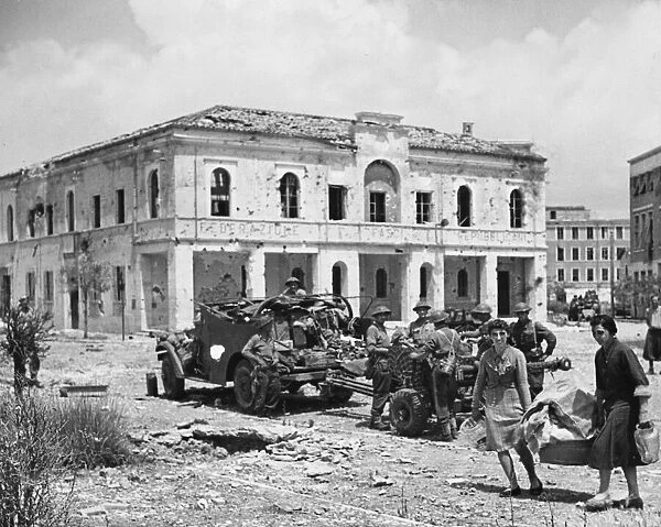 5th Army enters Littoria followed by Italian refugees. June 6th 1944