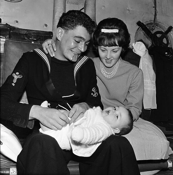 6-month-old Susan McGuffie meeting her dad for the first time