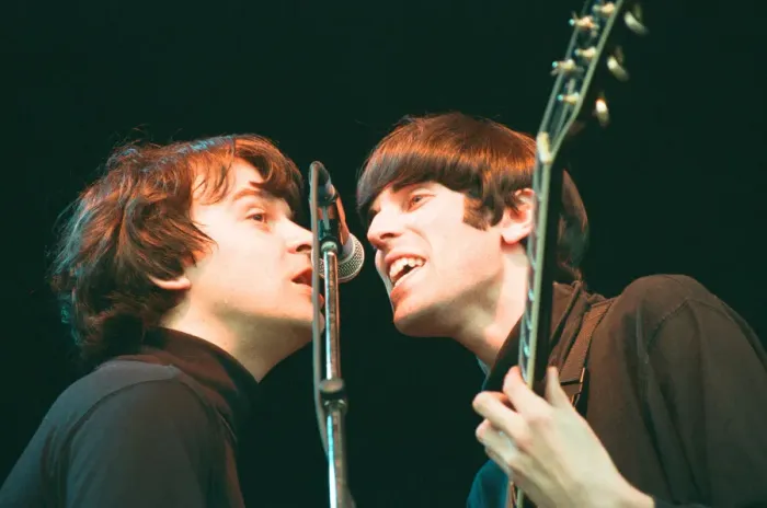 Framed Print : A 60s and 70s concert featuring look-a-like bands Beatlemania