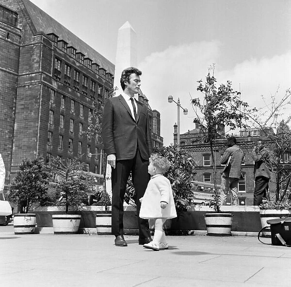 6ft 3 Clint Eastwood, pictured in St Peters Square, Manchester, with Antony Rixon