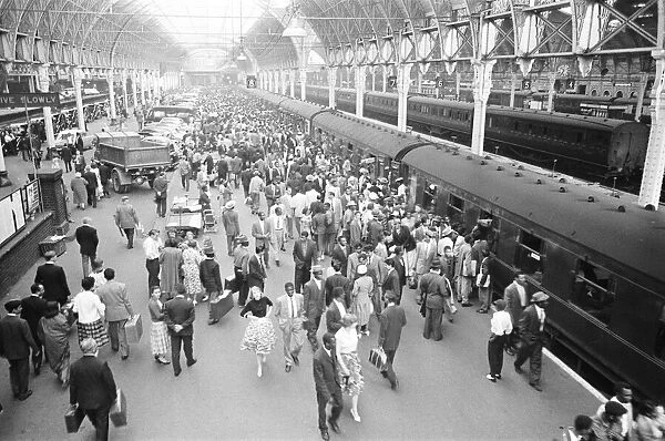 700 West Indian immigrants arrive at Paddington Station, London