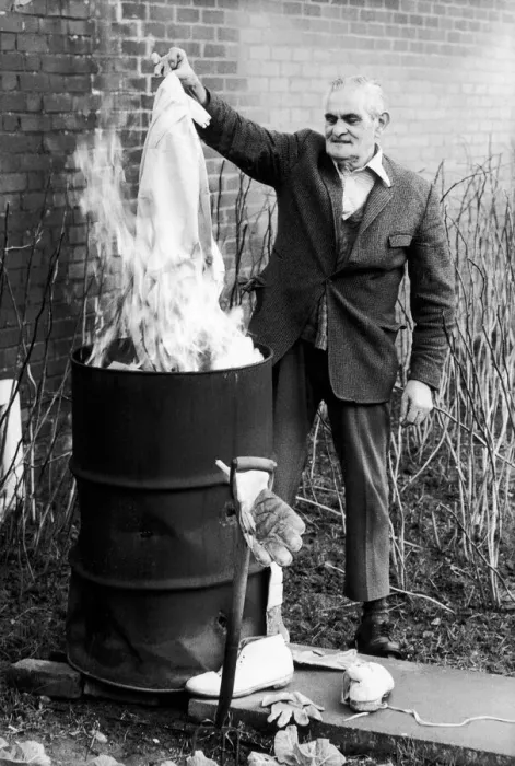Framed Print : 71 year old Tom Lawford burns his whites at the end of his 60 year amateur cricket career Framed Print : 71 year old Tom Lawford burns his whites at the end of his 60 year amateur cricket career