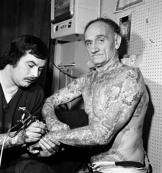 72-year-old Wilf Hardy whos body is covered in tattoos