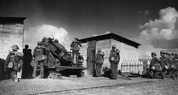 9. 2-inch howitzer and gun crew during a practise shoot at the School of Artillery at