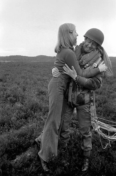 9th Independent Parachute Squadron with wife after drop. February 1975 75-00893-003
