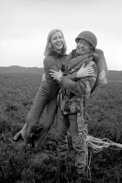 9th Independent Parachute Squadron with wife after drop. February 1975 75-00893-006
