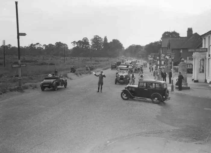 Framed Print : A a patrolman directs August Bank Holiday traffic outside The Orleans Arms situated