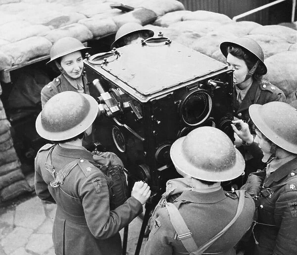 A. T. S. girls work with a guns. 23rd April 1941