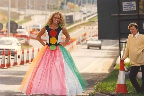 A1 traffic stopper... Jean Graham models the traffic lights dress near designer Sue
