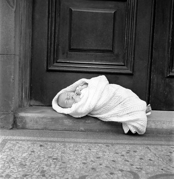 Abandoned baby. July 1953 D3753