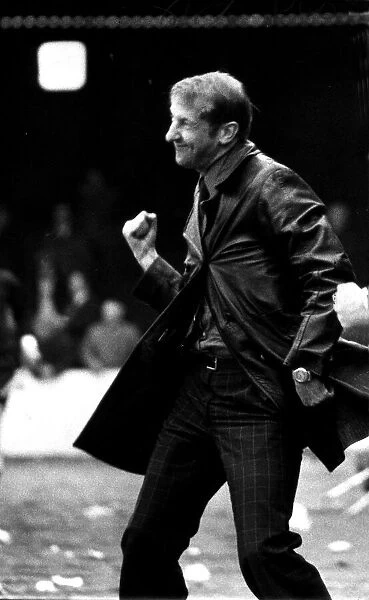 Aberdeen football manager clenches his fist as he celebrates a goal. Circa 1977