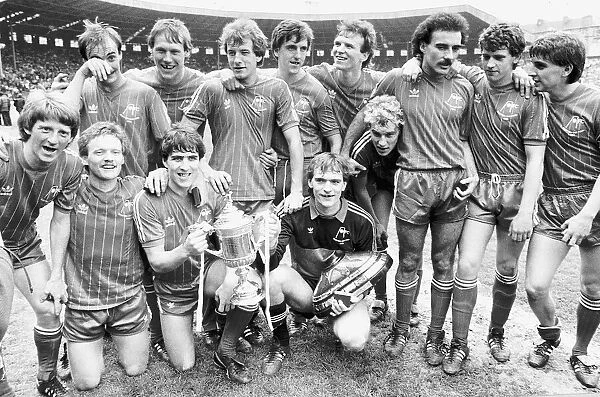 Aberdeen football players team celebrate after winning the 1983 Scottish FA Cup trophy