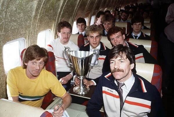 The Aberdeen team on their flight home from Gothenburg with the Europan Cup Winners Cup