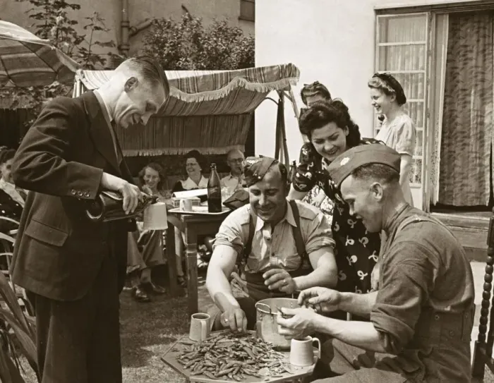 Framed Print : ABWW2 37 Canadian troops shucking (shelling) peas in an English garden