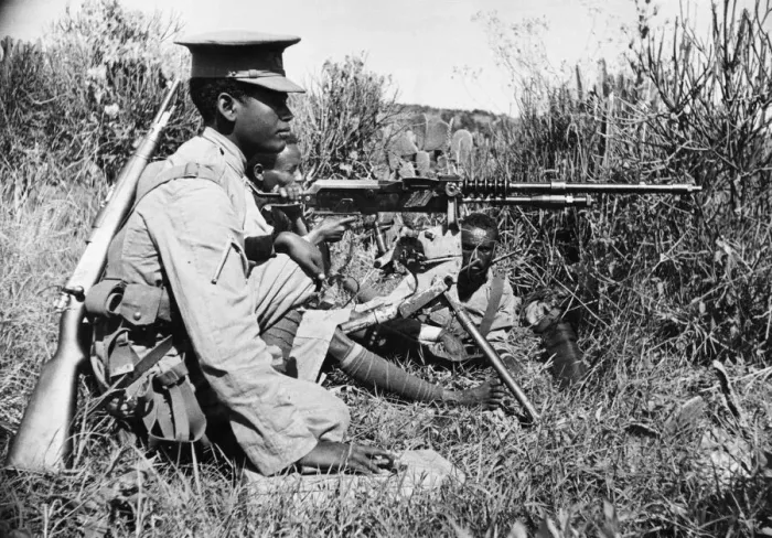 Framed Print : Abyssinian War September 1935 Abyssinian machine gunner firing an old Hotchkiss Framed Print : Abyssinian War September 1935 Abyssinian machine gunner firing an old Hotchkiss