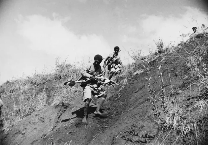 Framed Print : Abyssinian War September 1935 Abyssinian troops advancing making for a new position Framed Print : Abyssinian War September 1935 Abyssinian troops advancing making for a new position