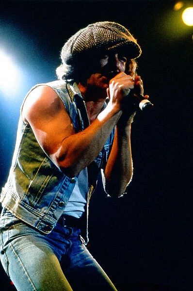 AC  /  DC in concert at Wembley Arena, singer Brian Johnson on stage. 16th January 1986