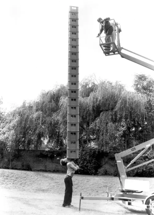 Framed Print : Acrobat Terry Cole, aged 26, breaks his previous record of balancing 16 empty milk crates Framed Print : Acrobat Terry Cole, aged 26, breaks his previous record of balancing 16 empty milk crates