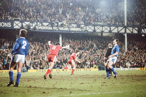 Action from the FA cup fourth round match replay between Everton
