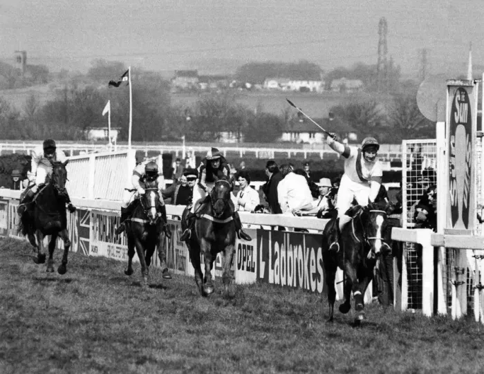 Framed Print : Action from the Grand National. Bob Champion celebrates as he crosses the line