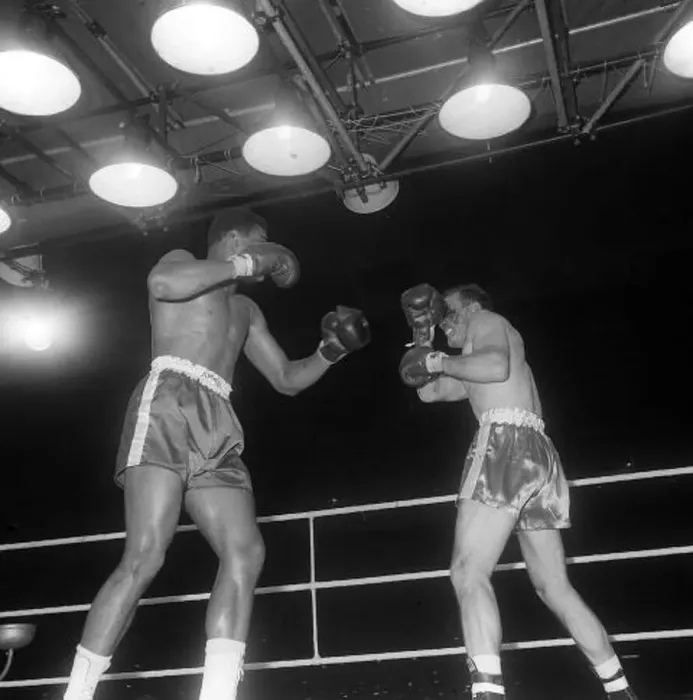 : Action during the non-title heavyweight fight between American Cassius Clay : Action during the non-title heavyweight fight between American Cassius Clay