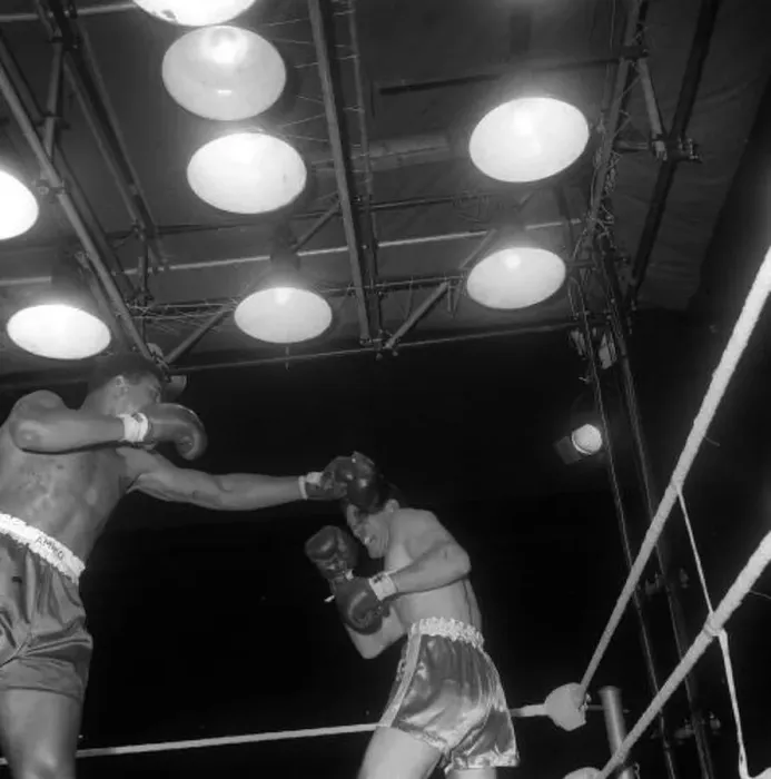 : Action during the non-title heavyweight fight between American Cassius Clay : Action during the non-title heavyweight fight between American Cassius Clay