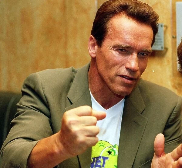 Actor Arnold Schwarzenegger June 1998 being interviewed by Helen Wathers at Planet
