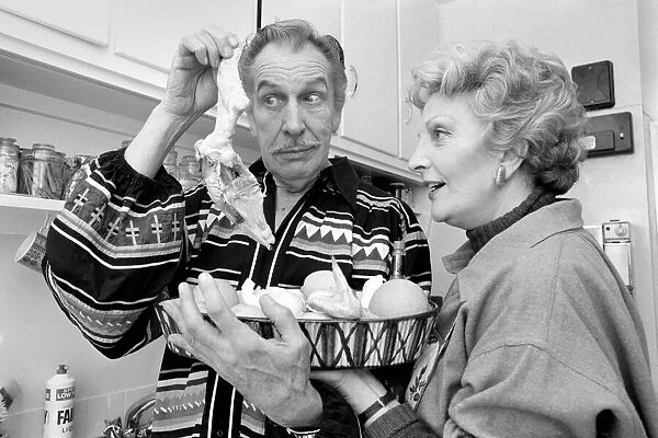 Actor and chef Vincent Price and his wife Coral seen here in the kitchen. May 1975