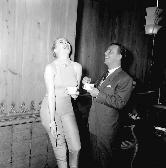 Framed Print : Actor and comedian Norman Wisdom with actress Anita Ekberg at the savoy Hotel in London