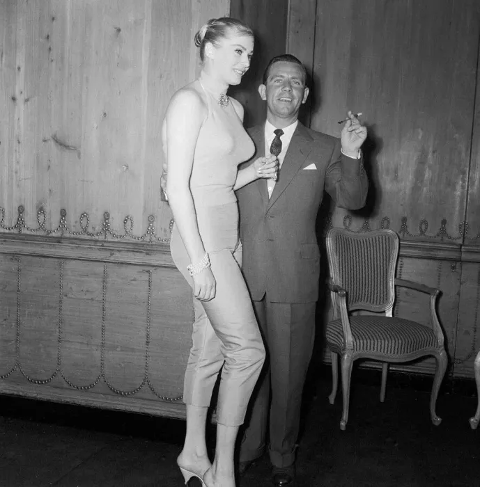 Framed Print : Actor and comedian Norman Wisdom enjoys a cup of tea with actress Anita Ekberg