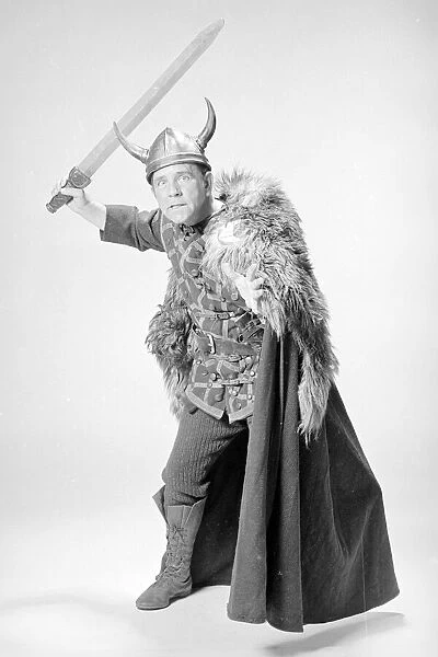 Actor comedian Norman Wisdom in Shakespearen costume, seen here as the King of Denmark