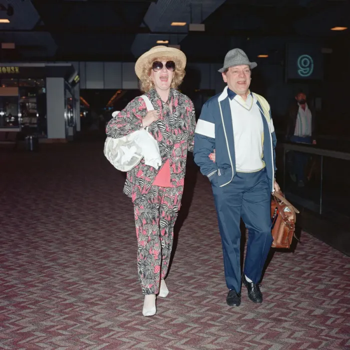 Framed Print : Actor David Jason and girlfriend Myfanwy Talog leaving Heathrow Airport for a holiday in