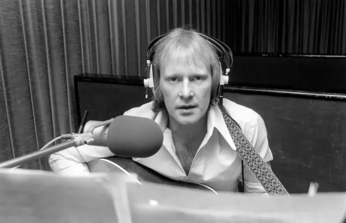 Framed Print : Actor Dennis Waterman, seen here in the recording studio with his guitar. December 1975 Framed Print : Actor Dennis Waterman, seen here in the recording studio with his guitar. December 1975