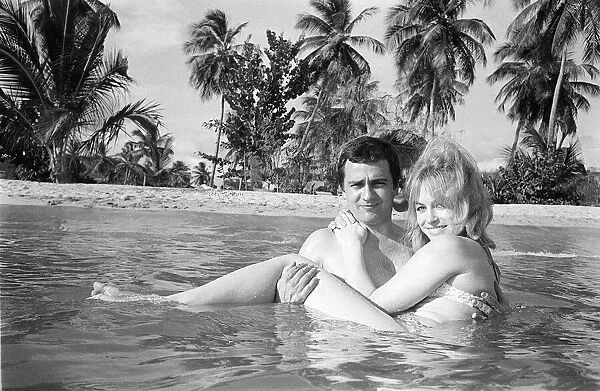 Actor Dudley Moore with Suzy Kendall on holiday 1966 in Caribbean