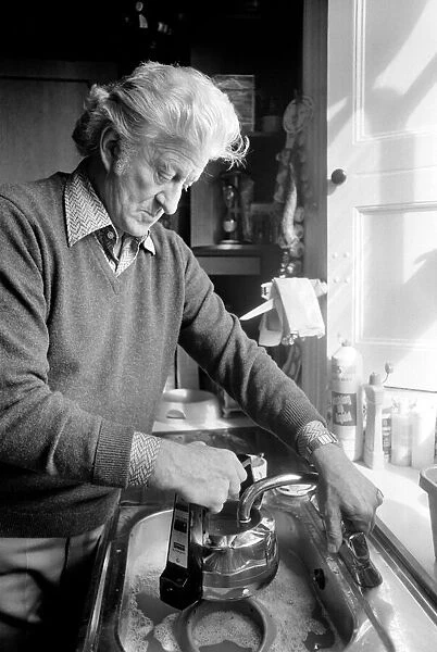 Actor John Pertwee seen here at home making tea. March 1981 PM 81-01203-001
