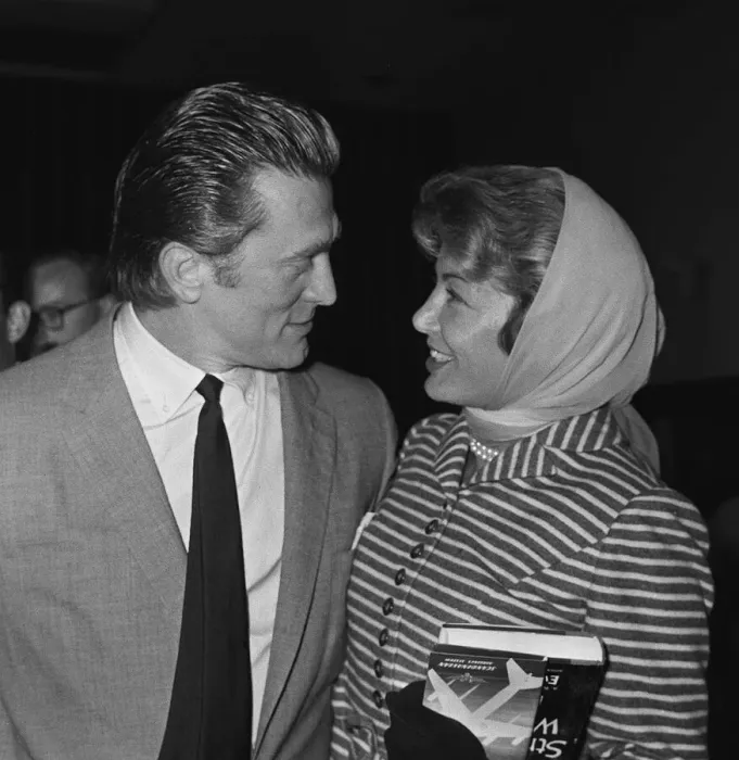 Framed Print : Actor Kirk Douglas at London Airport with his wife August 1958 Framed Print : Actor Kirk Douglas at London Airport with his wife August 1958