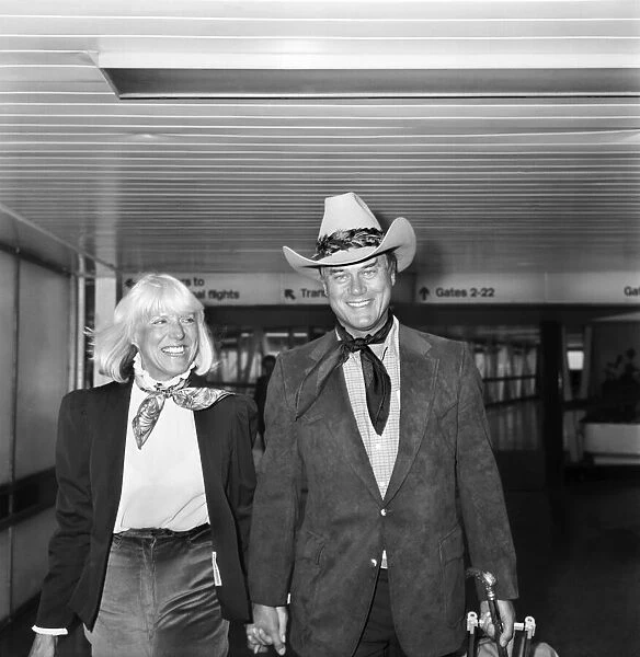 Actor Larry Hagman, Dallass J. R. Ewing, and his wife Maj arrive at London