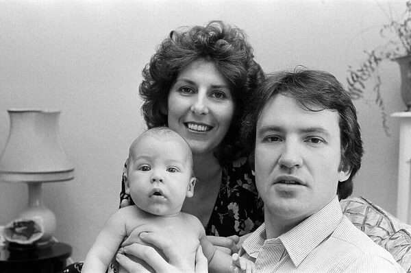 Actor Larry Lamb with his wife Linda and three month old son George. 15th March 1980