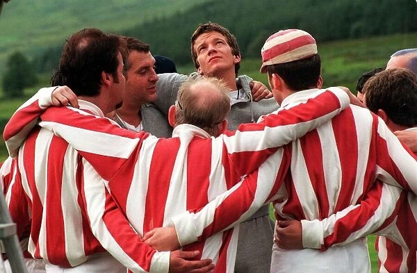 Actor Max Beesley August 1998 looking out from huddle during filming of The Match at