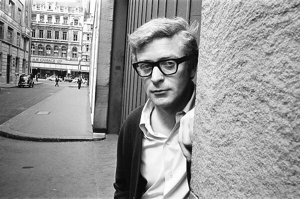Actor Michael Caine pictured in the centre of London in July 1964
