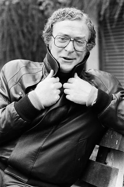 Actor Michael Caine poses wearing a leather jacket. 13th October 1987
