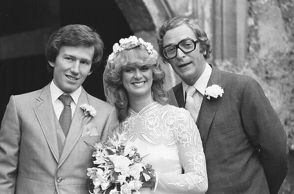 Actor Michael Caine stands with his daughter Niki and her groom showjumper Rowland