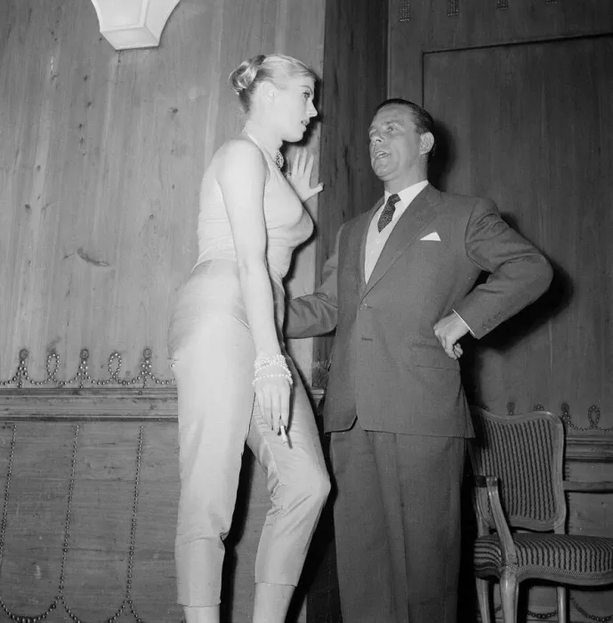 Framed Print : Actor Norman Wisdom with actress Anita Ekberg at the Savoy Hotel in London