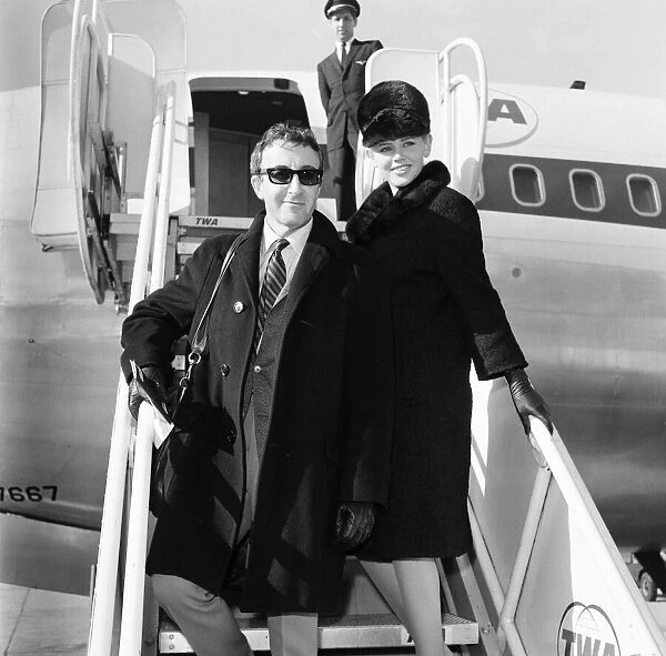 Actor Peter Sellers at London Airport with his wife Britt Ekland