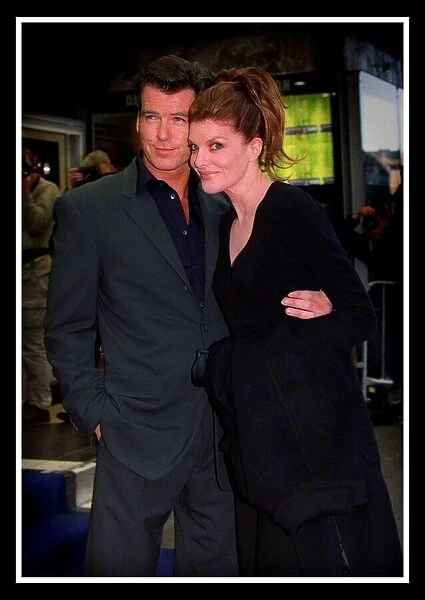 Actor Pierce Brosnan August 1999 with actress Rene Russo at the premiere of the film